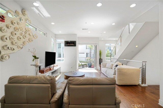 5823 Seahorse Ct, Playa Vista, CA 90094 - living area with wood finished floors, recessed lighting, and stairs