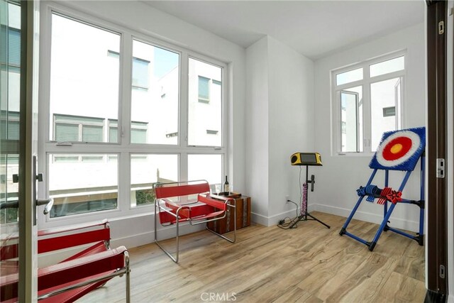 5823 Seahorse Ct, Playa Vista, CA 90094 - living area featuring wood finished floors and baseboards