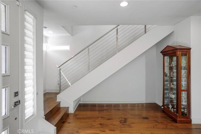 5823 Seahorse Ct, Playa Vista, CA 90094 - staircase with healthy amount of natural light, wood finished floors, and recessed lighting