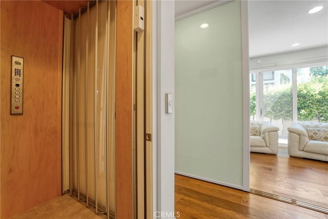 5823 Seahorse Ct, Playa Vista, CA 90094 - hall featuring wood finished floors, elevator, and recessed lighting