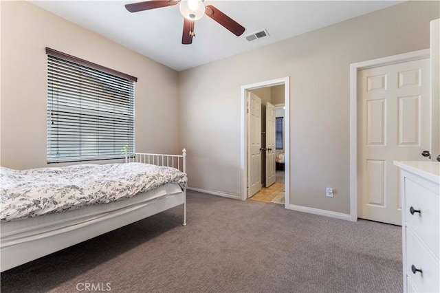 12178 Scenic Vw, Riverside, CA 92505 - bedroom with light carpet, baseboards, and a ceiling fan