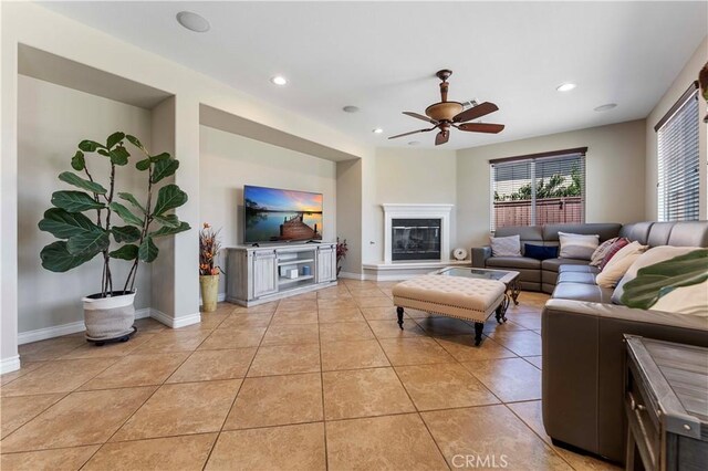 12178 Scenic Vw, Riverside, CA 92505 - living room featuring ceiling fan, light tile patterned floors, recessed lighting, a glass covered fireplace, and baseboards