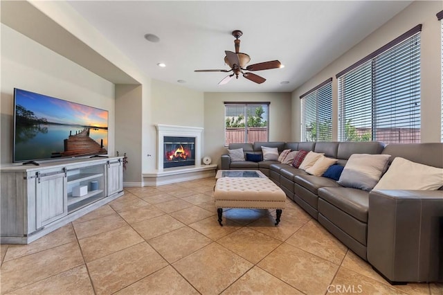 12178 Scenic Vw, Riverside, CA 92505 - living room with light tile patterned flooring, a glass covered fireplace, a ceiling fan, baseboards, and recessed lighting