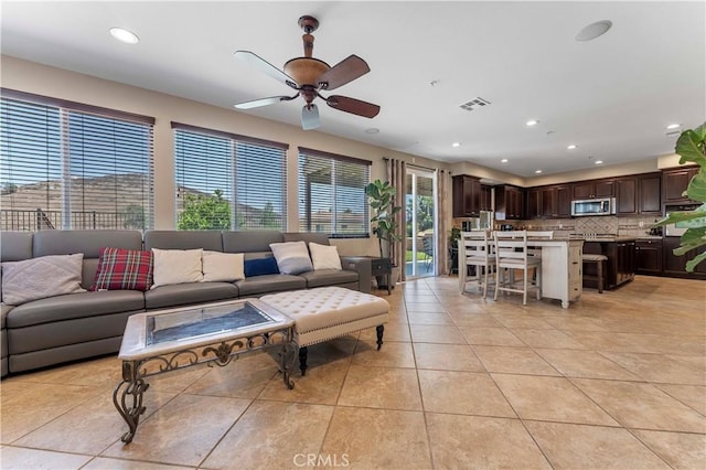 12178 Scenic Vw, Riverside, CA 92505 - living area with light tile patterned floors, ceiling fan, and recessed lighting