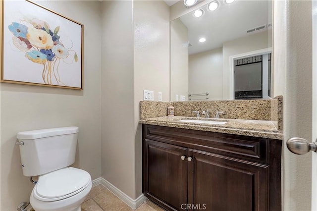 12178 Scenic Vw, Riverside, CA 92505 - half bath with toilet, baseboards, vanity, tile patterned floors, and recessed lighting
