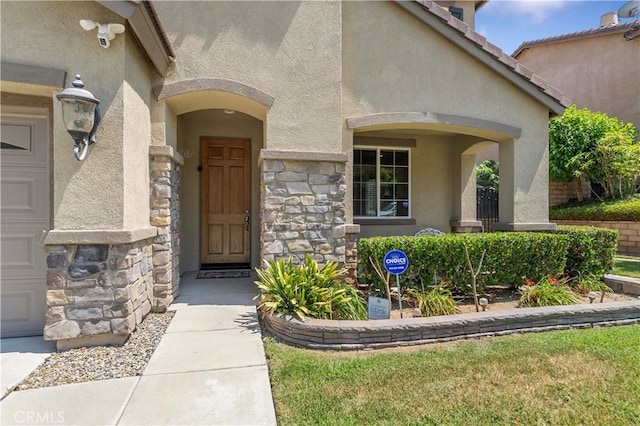 12178 Scenic Vw, Riverside, CA 92505 - doorway to property featuring stone siding and stucco siding