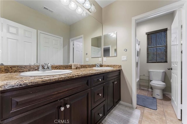 12178 Scenic Vw, Riverside, CA 92505 - bathroom with double vanity, toilet, tile patterned flooring, shower / bath combo, and baseboards