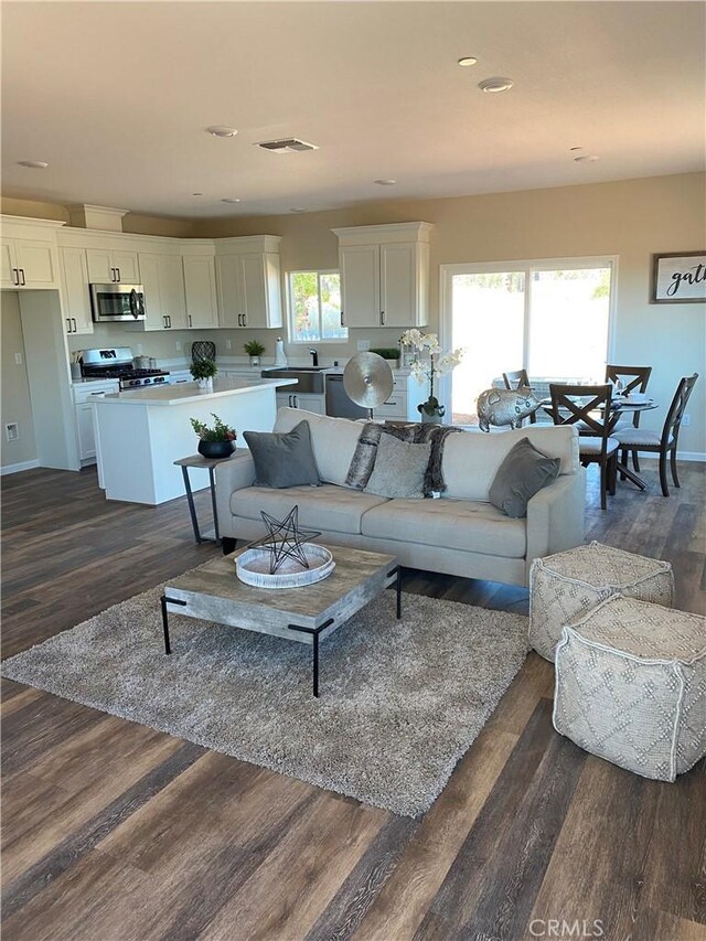 1488 Bille Rd, Paradise, CA 95969 - living area featuring dark wood-type flooring and recessed lighting
