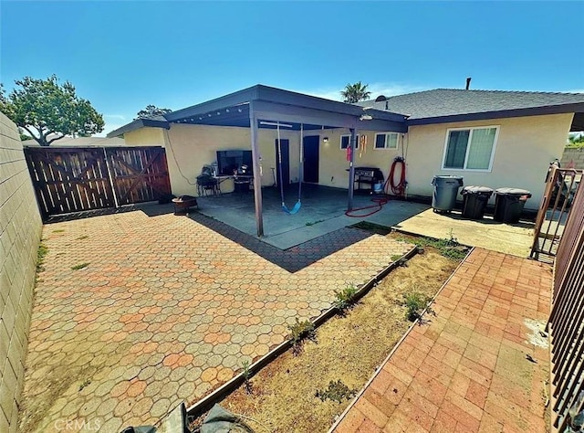 7534 Layton St, Rancho Cucamonga, CA 91730 - rear view of property featuring stucco siding, a patio, and a fenced backyard