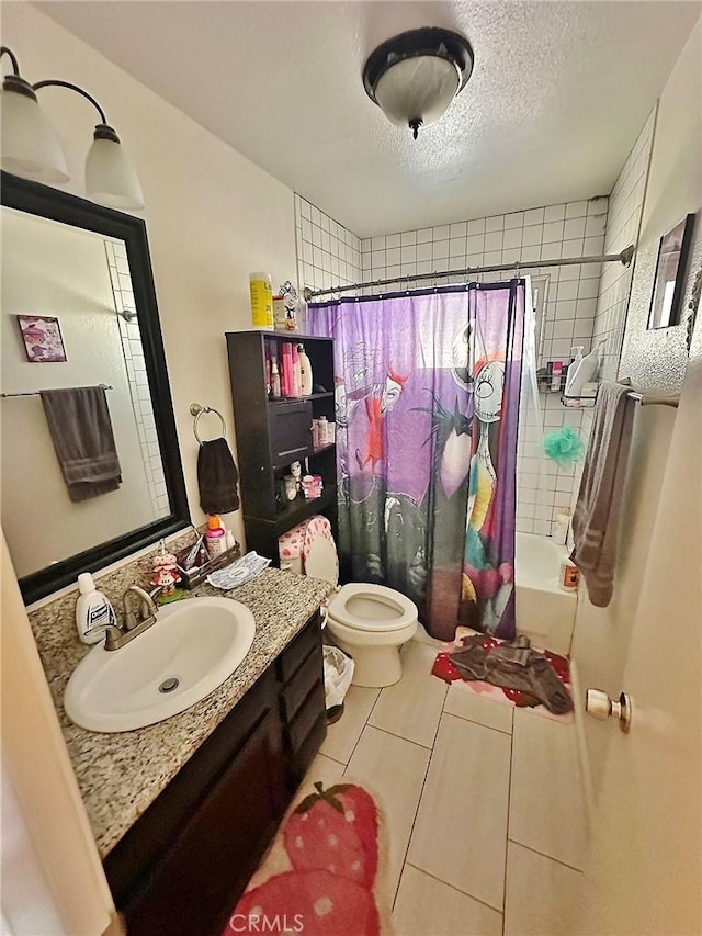 7534 Layton St, Rancho Cucamonga, CA 91730 - bathroom featuring shower / tub combo, toilet, vanity, a textured ceiling, and tile patterned flooring