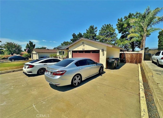 7534 Layton St, Rancho Cucamonga, CA 91730 - view of front of home featuring driveway, stucco siding, and an attached garage