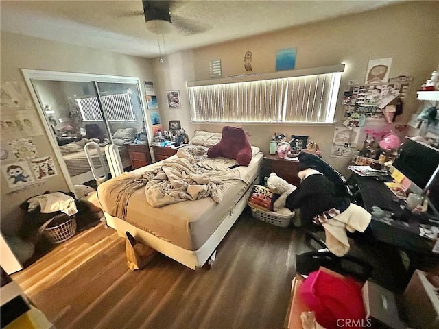 7534 Layton St, Rancho Cucamonga, CA 91730 - bedroom featuring wood finished floors, a closet, and a ceiling fan