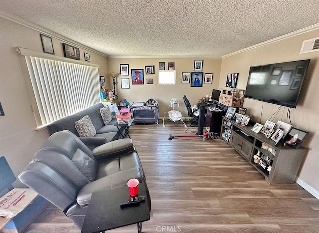 7534 Layton St, Rancho Cucamonga, CA 91730 - living area with wood finished floors, crown molding, a textured ceiling, and baseboards