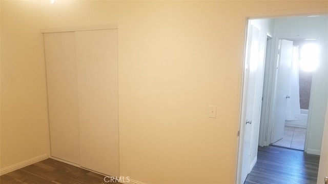 10241 Ruoff Ave, Whittier, CA 90604 - hall with dark wood finished floors and baseboards