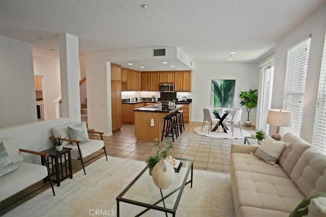 27045 Fairway Ln, Valencia, CA 91381 - living area featuring stairs and light tile patterned flooring