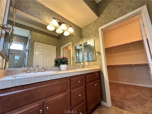 24212 Nobe St, Corona, CA 92883 - bathroom featuring double vanity, a shower stall, baseboards, a chandelier, and a walk in closet