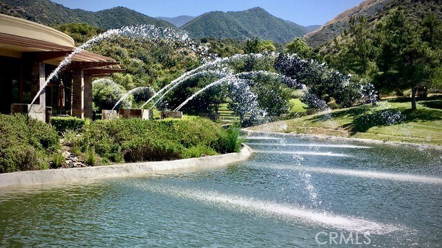 24212 Nobe St, Corona, CA 92883 - view of home's community with a water and mountain view