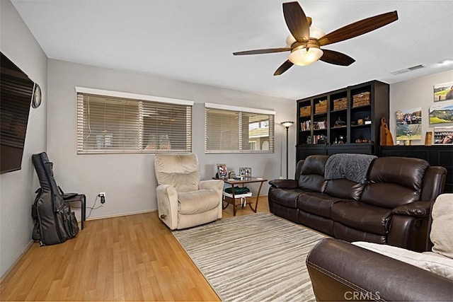 1040 Central Ave Unit 10, Riverside, CA 92507 - living room with ceiling fan, wood finished floors, and baseboards