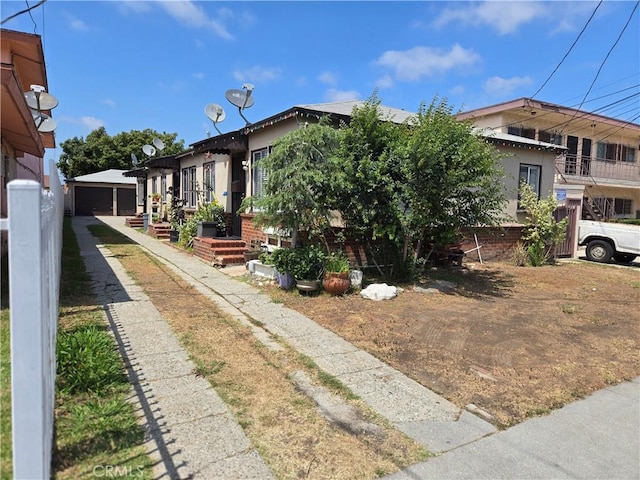 1609 W 107th St, County Los Angeles, CA 90047 - view of front facade featuring an outdoor structure