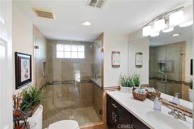 40425 Pebble Beach Cir, Palm Desert, CA 92211 - full bathroom featuring toilet, vanity, a shower stall, and recessed lighting