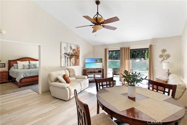40425 Pebble Beach Cir, Palm Desert, CA 92211 - dining area with a ceiling fan, high vaulted ceiling, and light wood-style flooring