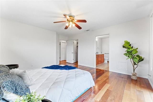 9818 Capulet Ave, Whittier, CA 90603 - bedroom featuring light wood-type flooring, ensuite bath, ceiling fan, and baseboards