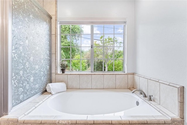 9818 Capulet Ave, Whittier, CA 90603 - bathroom featuring a garden tub and healthy amount of natural light