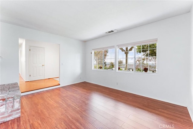 9818 Capulet Ave, Whittier, CA 90603 - spare room with healthy amount of natural light and light wood finished floors