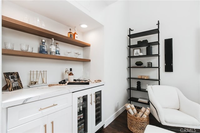 1617 S Beverly Glen Blvd Unit 301, Los Angeles, CA 90024 - indoor dry bar featuring dark wood-style flooring, baseboards, wine cooler, and recessed lighting