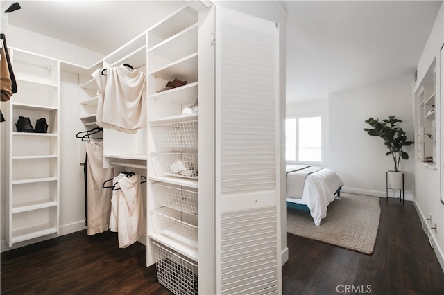 1617 S Beverly Glen Blvd Unit 301, Los Angeles, CA 90024 - spacious closet featuring dark wood-style flooring