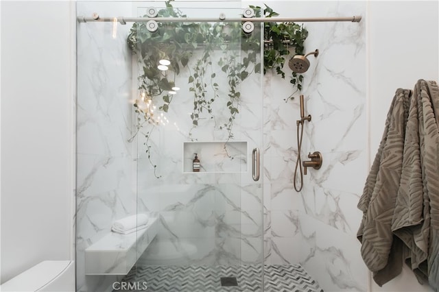 1617 S Beverly Glen Blvd Unit 301, Los Angeles, CA 90024 - bathroom featuring a marble finish shower and toilet