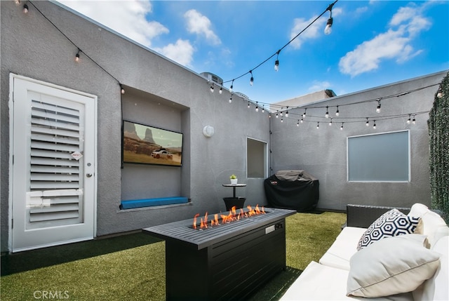 1617 S Beverly Glen Blvd Unit 301, Los Angeles, CA 90024 - view of green lawn featuring an outdoor living space with a fire pit