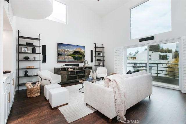 1617 S Beverly Glen Blvd Unit 301, Los Angeles, CA 90024 - living area with a high ceiling and wood finished floors