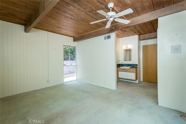1560 Sheridan, Glendale, CA 91206 - unfurnished room with wooden ceiling with exposed beams, a ceiling fan, light carpet, a sink, and wooden walls