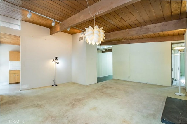 1560 Sheridan, Glendale, CA 91206 - carpeted empty room featuring wood ceiling with exposed beams and track lighting