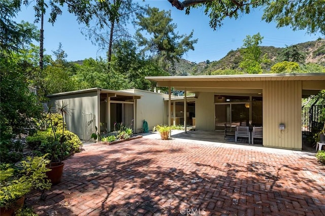 1560 Sheridan, Glendale, CA 91206 - rear view of house featuring a patio area