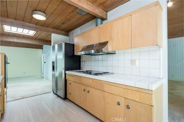 1560 Sheridan, Glendale, CA 91206 - kitchen with under cabinet range hood, stainless steel fridge with ice dispenser, wood ceiling with exposed beams, electric stovetop, and a skylight