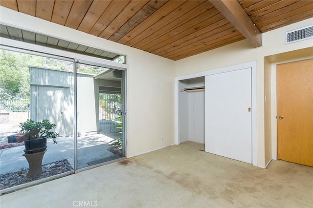 1560 Sheridan, Glendale, CA 91206 - unfurnished bedroom with access to outside, carpet flooring, wooden ceiling with exposed beams, and a closet