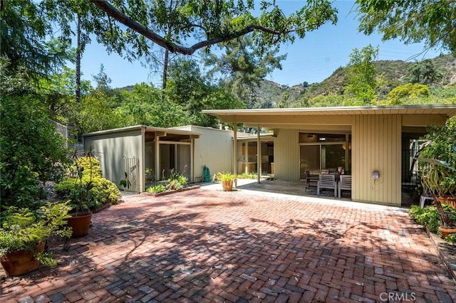 1560 Sheridan, Glendale, CA 91206 - back of house featuring a patio and a mountain view