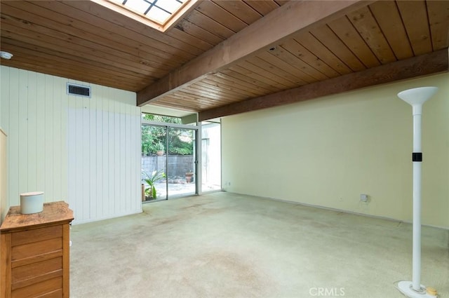 1560 Sheridan, Glendale, CA 91206 - carpeted empty room with wood ceiling with exposed beams