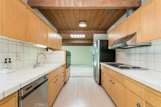 1560 Sheridan, Glendale, CA 91206 - kitchen with ventilation hood, stainless steel appliances, a sink, light wood-style flooring, and tile countertops