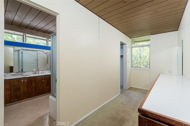 1560 Sheridan, Glendale, CA 91206 - corridor featuring wooden ceiling, baseboards, light colored carpet, and a sink