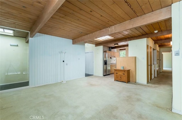 1560 Sheridan, Glendale, CA 91206 - below grade area with stainless steel fridge, wood ceiling, and light carpet