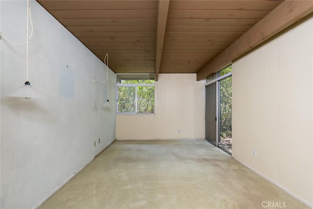 1560 Sheridan, Glendale, CA 91206 - carpeted empty room featuring wood ceiling with exposed beams