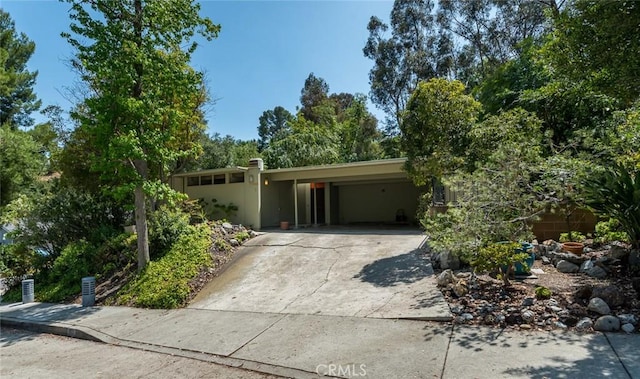 1560 Sheridan, Glendale, CA 91206 - view of front facade featuring driveway and an attached carport