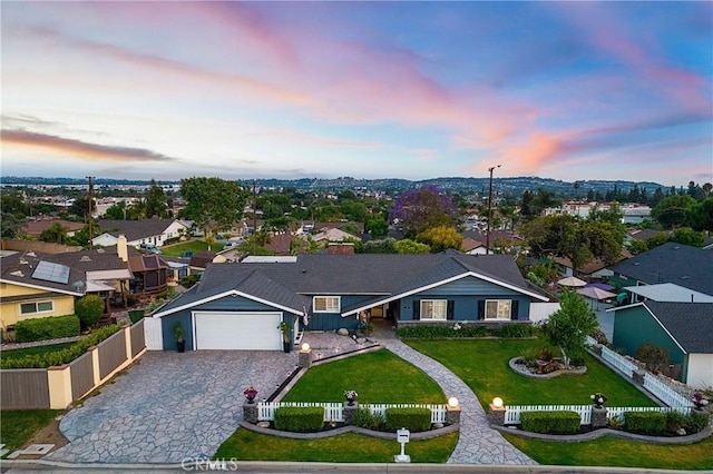 210 View Dr, La Habra, CA 90631 - view of front of home with a garage, decorative driveway, a residential view, and board and batten siding