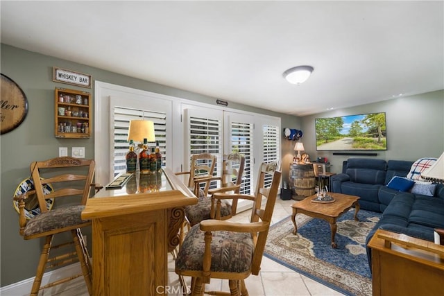 210 View Dr, La Habra, CA 90631 - living area featuring light tile patterned flooring and a bar