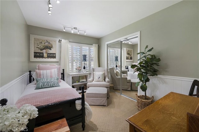 210 View Dr, La Habra, CA 90631 - bedroom featuring wainscoting, a closet, a decorative wall, and carpet