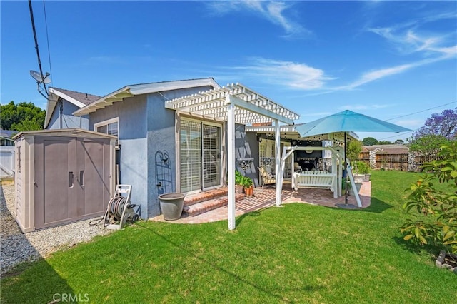 210 View Dr, La Habra, CA 90631 - rear view of house with a pergola, stucco siding, and a patio area