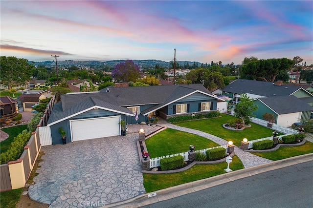 210 View Dr, La Habra, CA 90631 - ranch-style house featuring an attached garage, decorative driveway, a residential view, and board and batten siding